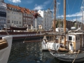 Jedna z nejhezčích ulic Nyhavn v Kodani s kanálem uprostřed